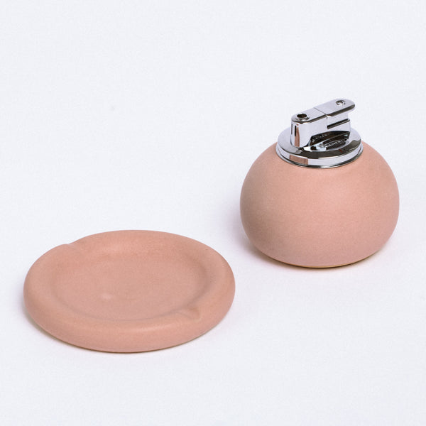 Pink handmade ceramic table lighter and ashtray. Maison Ko x Olivia Snow Ceramics Pebble Lighter. 