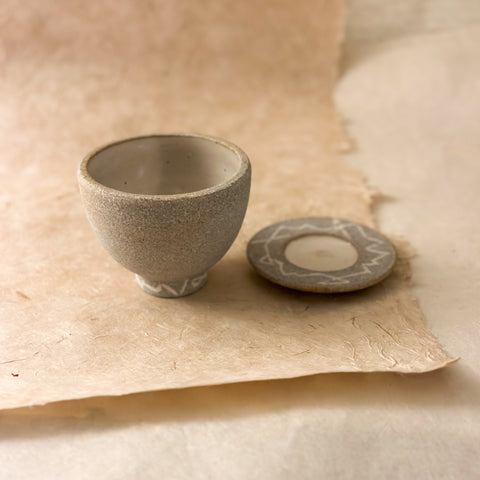 stone handmade ceramic cup and saucer