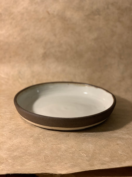 wide low bowl. dark brown and white