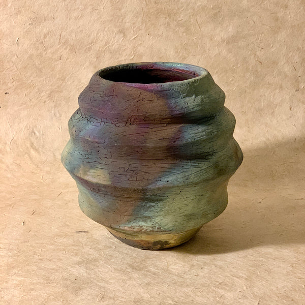 rainbow angled moon vase. Rainbow raku vase.