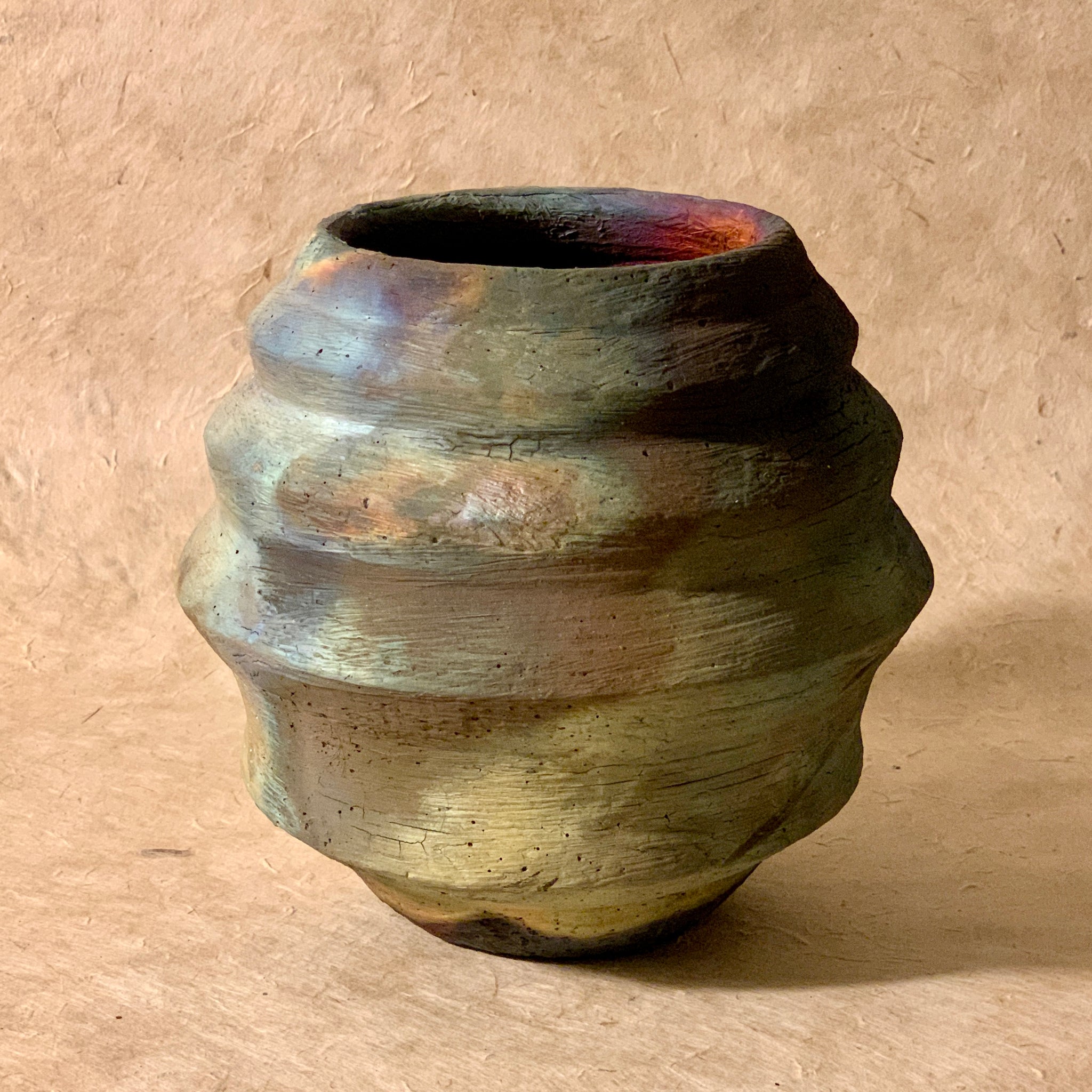 rainbow angled moon vase. Rainbow raku vase.