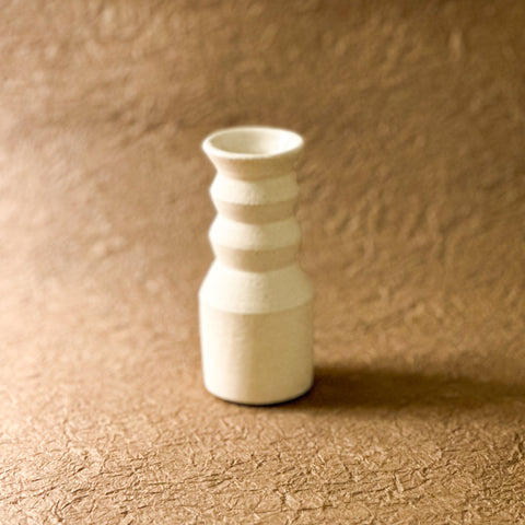 mini white angled handmade ceramic vase. 