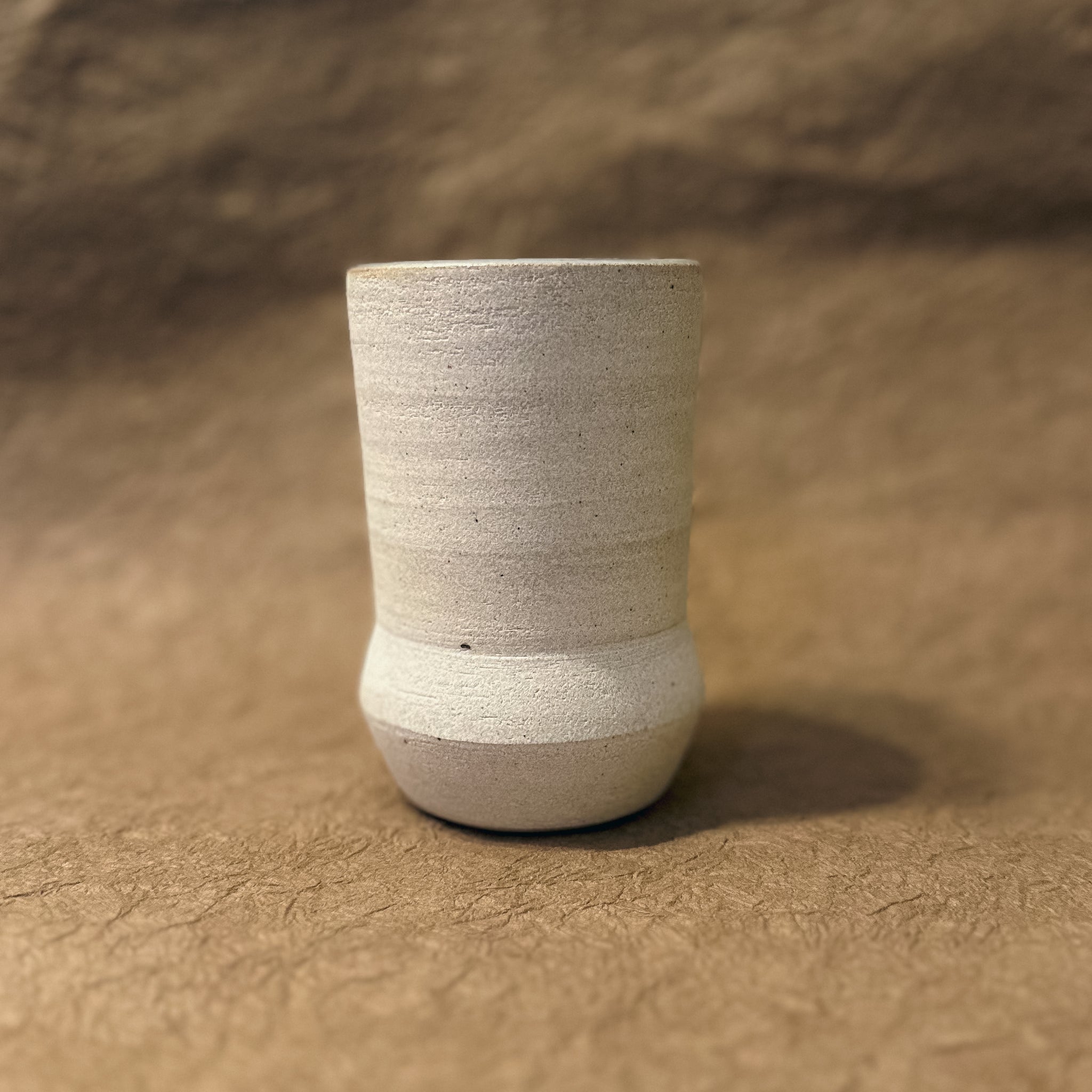 Stone White Tumbler with an angled base