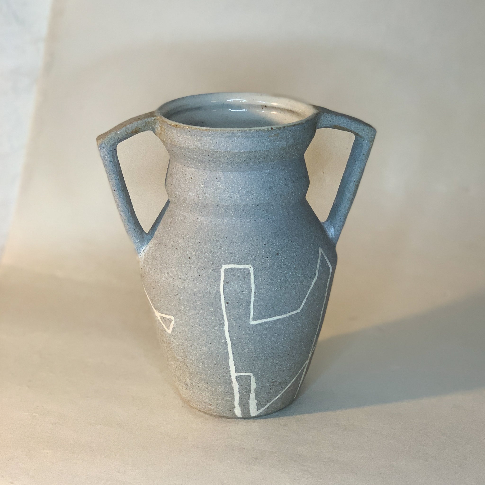 Grey Angled Two Handled Vase with White line grpahic