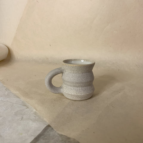 stone white espress mug. angled and handmade. 